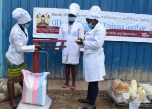 Photo 108999 students receiving and weighing squash varieties for food fortification innovation